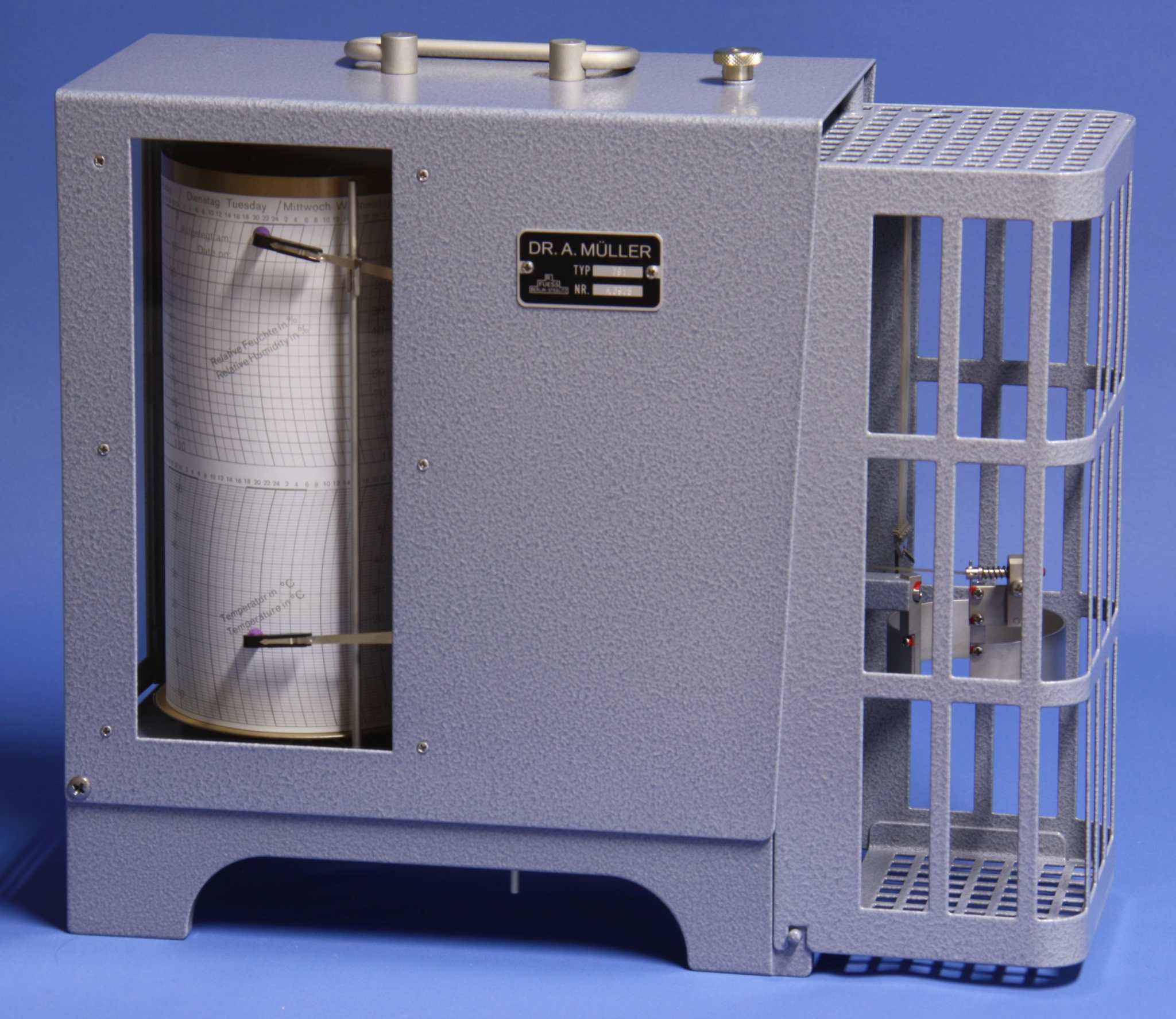Thermohygrograph for measuring and recording temperature and humidity.