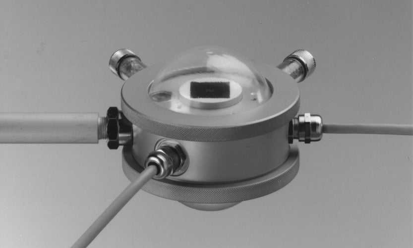 Pyrradiometer with metal body and protective domes showcasing dual blackened receiver surfaces.