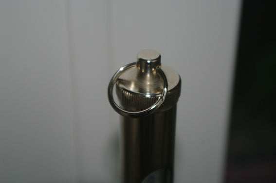 Close-up of metal casing top of Ersatz-Wasser-Schöpfthermometer with ring.