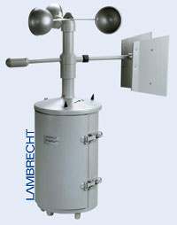 Mechanical wind recorder "Windschreiber nach Woefle" with metal casing for registering wind direction and path using a band recorder; features detachable vane and robust design.