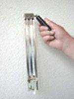 Close-up of a psychrometer with wet and dry bulb thermometers used for measuring humidity