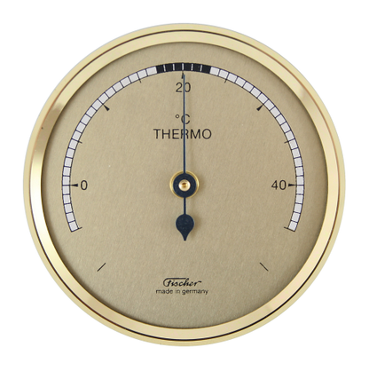 Bimetallthermometer with gold casing showing temperature in Celsius.