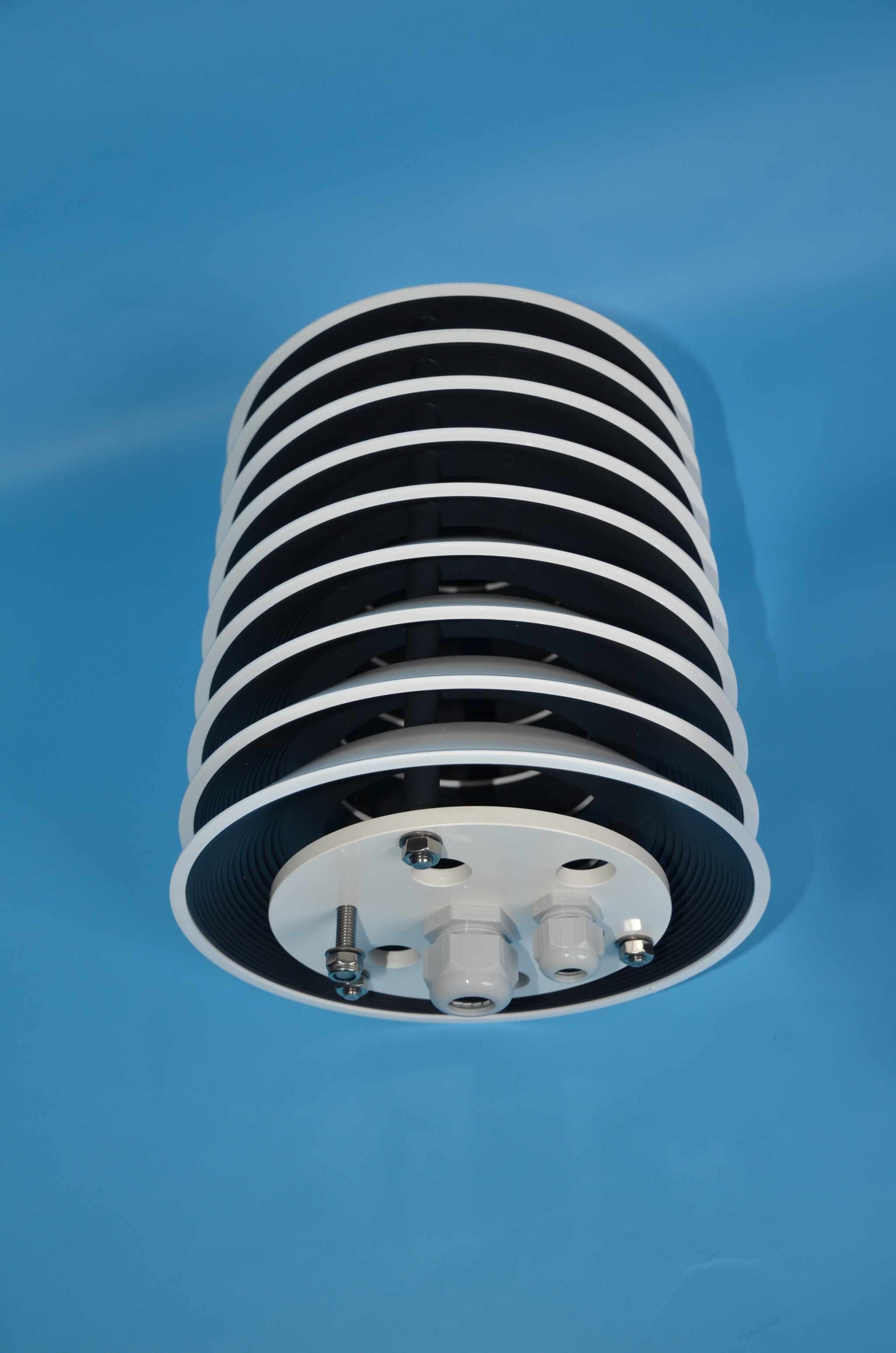 Radiation shield housing with plastic slats for temperature and humidity sensors, naturally ventilated.